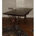 An Art Nouveau steel and copper coffee table with an iroko top H: 55 L: 120 cm