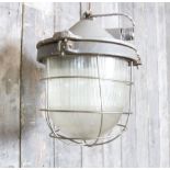 Industrial steel and linear opaque cage light,