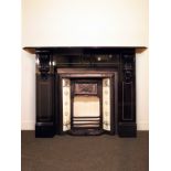 Fine slate fire surround with corbel bracketed shelf H: 120 W: 165 cm