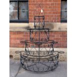 Victorian wrought iron tiered garden plant stand with scroll design H: 160 W: 130 cm