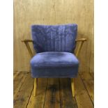 A set of 3 Mid Century beech wood frame and blue floral upholstered cocktail chair with tapered