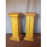 Pair of Victorian painted pine gaudy yellow pedestals with green and red linear