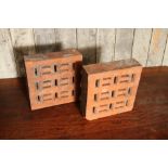 A pair of Victorian terracotta airbricks