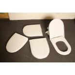 Contemporary plastic RAK Ceramics empire soft close toilet seats.