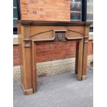 Large oak fireplace surround with heraldic crest H: 133 W: 173 cm