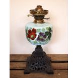 Victorian ceramic hand painted floral oil lamp with cast base and brass fixture -a/f H: 39 cm