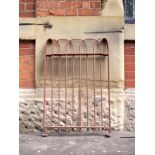 Antique iron railings in a curved formation painted red H: 93 W: 62 cm