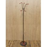 Mid Century steel atomic coat and hat stand with red bakelite hook ends H : 175 cm