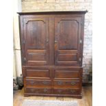Victorian oak linen press with large storage opening and 4 lower drawer units with brass drop