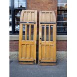 A pair of Victorian Gothic pine 2 panel semi arched glazed 2 panel doors.