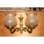 Victorian style brass wall light with simple swirl arms and orginal Victorian bulbous peach etched