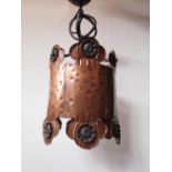 Arts and Crafts copper and wrought iron pendant light with embossed detail H: 50 W: 20 cm
