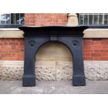 Victorian cast iron fire surround with floral detail and serpentine mantel H: 112 W: 135 cm