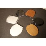 5 contemporary assorted toilet seats in various material finishes