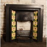 Art Nouveau cast iron tiled insert with yellow floral tiles and complementary border tiles 96 x 96