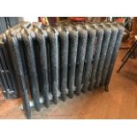 12 section decorative radiator in graphite grey finish has leaky joints which can be fixed H: 77 L: