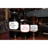 Set of 4 mid century glass polish apothecary bottles with handwritten labels,