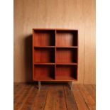 Contemporary teak veneer book case with brushed chrome feet H : 1300 W : 95 cm