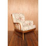 Mid Century beech Ercol wide armchair with pale floral upholstered cushions H: 86 W: 82