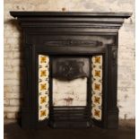 Victorian cast iron combination tiled fireplace.