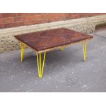Contemporary iroko panga hatch top coffee table with steel hairpin legs in yellow H: 40 L: 91 W: 63