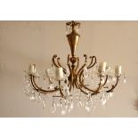 A Victorian 8 arm brass and glass chandelier with candle lamp holder H : 53 cm