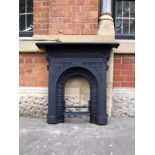 Victorian cast iron combination fireplace with floral arched inner and frieze H: 102 W: 105