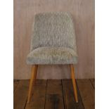 Mid Century sage coloured upholstered cocktail chair with diamond embossed upholstery and beech