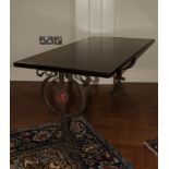 An Art Nouveau occasional table with an iroko top H: 77 L: 120 cm