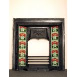 Art Nouveau cast iron tiled fireplace insert with red flowers on green background 95 x 95 cm