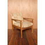 A pair of Mid Century oak framed armchairs in a light beige fabric H: 74 W: 30 cm
