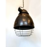 Industrial Eastern Bloc bakelite pendant with cage feature H: 83 W: 23 cm