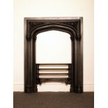 Victorian cast iron insert with arched opening and corner friezes H: 92 W: 71 cm