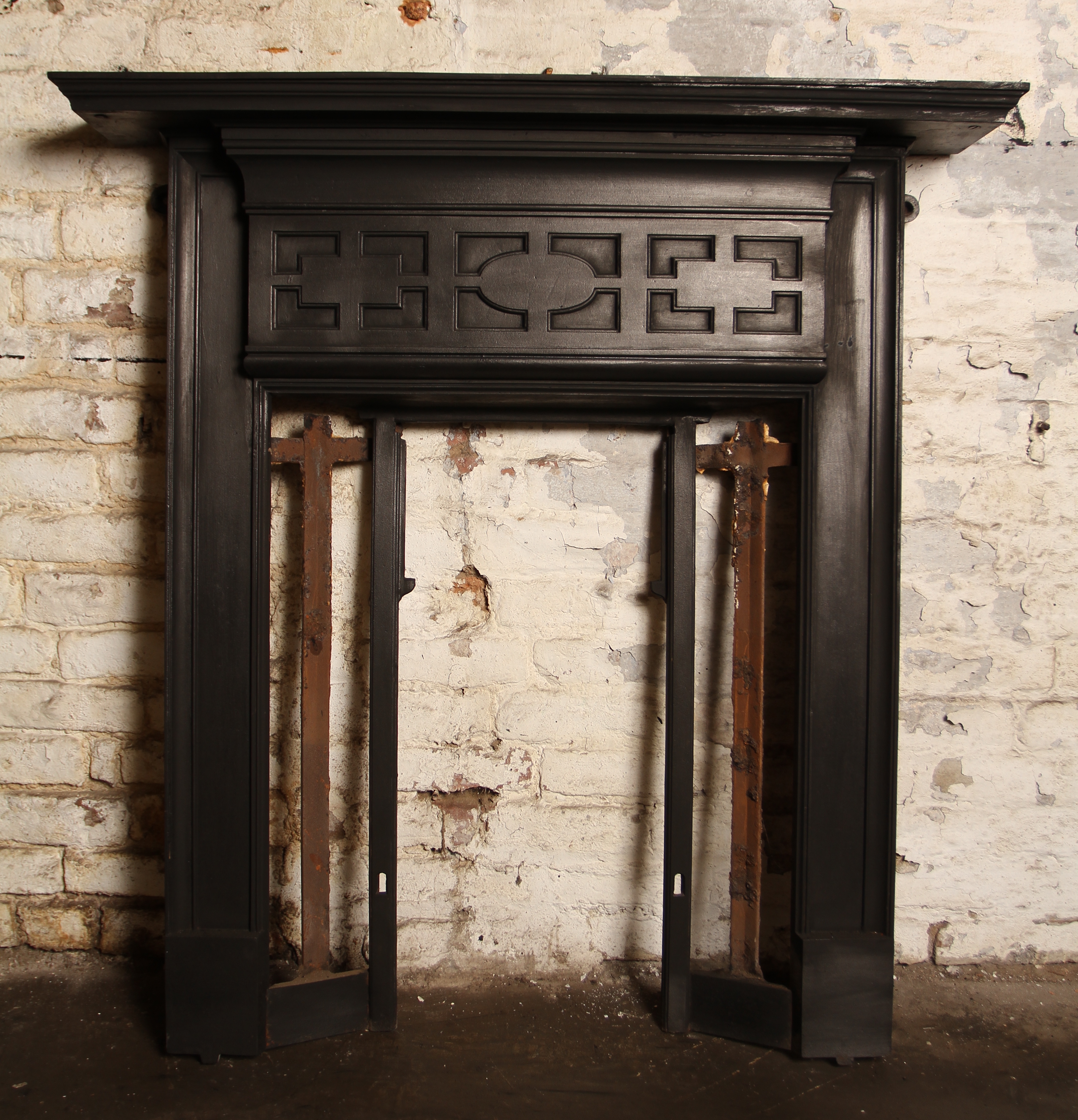 Victorian cast iron combination tiled fireplace.