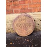 Coal hole cover with manufacturers details