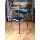A set of 11 Mid Century steel frame black padded upholstered stacking chairs H : 72 W : 46 cm (11