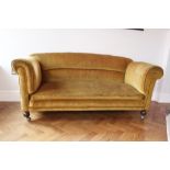 A Victorian yellow velour upholstered sofa on coaster wheels