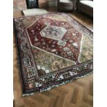 Antique Persian rug with 4 border design and a lilac, green,