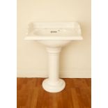 Victorian style white enamel sink with fluted pedestal H: 91 W: 63 cm