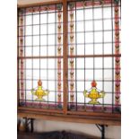 Large glass window panels with stained urns and decorative border edging H: 240 W: 115 cm