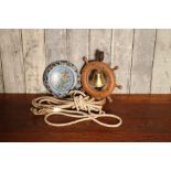 An antique rope, floral painted wall mounted bowl in blue and nautical bell light.