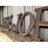 Antique cast iron fine set of letters making up the S.H.