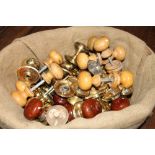 Basket of assorted door knobs (30 items)
