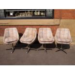 Set of six Circa 1960's check upholstered swivel dining chairs on chrome legs H : 80 W : 55 cm