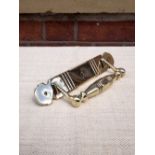 A pair of Victorian style polished brass door pulls 25 x 8 cm