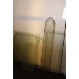 A quantity of etched glass panels coming in a variety of shapes and designs