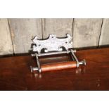 Victorian style chrome and stained oak 'The falcon' toilet roll holder
