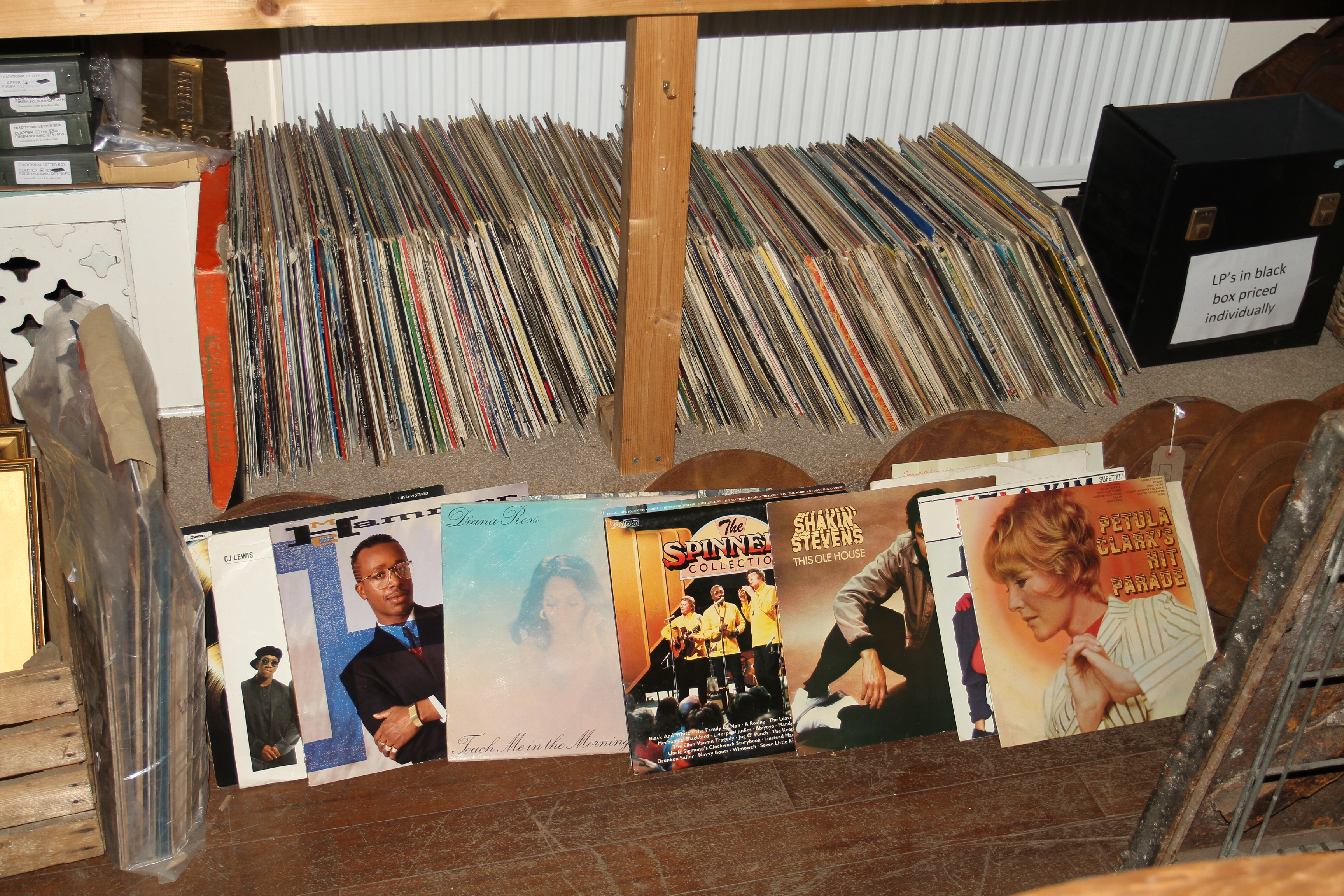 A quantity of 245 12" vinyl record albums from various genres of music dating between the 60's -