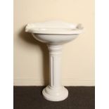 Victorian style porcelain wash basin with fluted pedestal H: 90 W: 64 cm