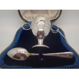 Hallmarked silver Christening twin handled egg cup and spoon with original box,